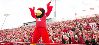Red background with Reggie Redbird and the words 'Redbirds Rising'